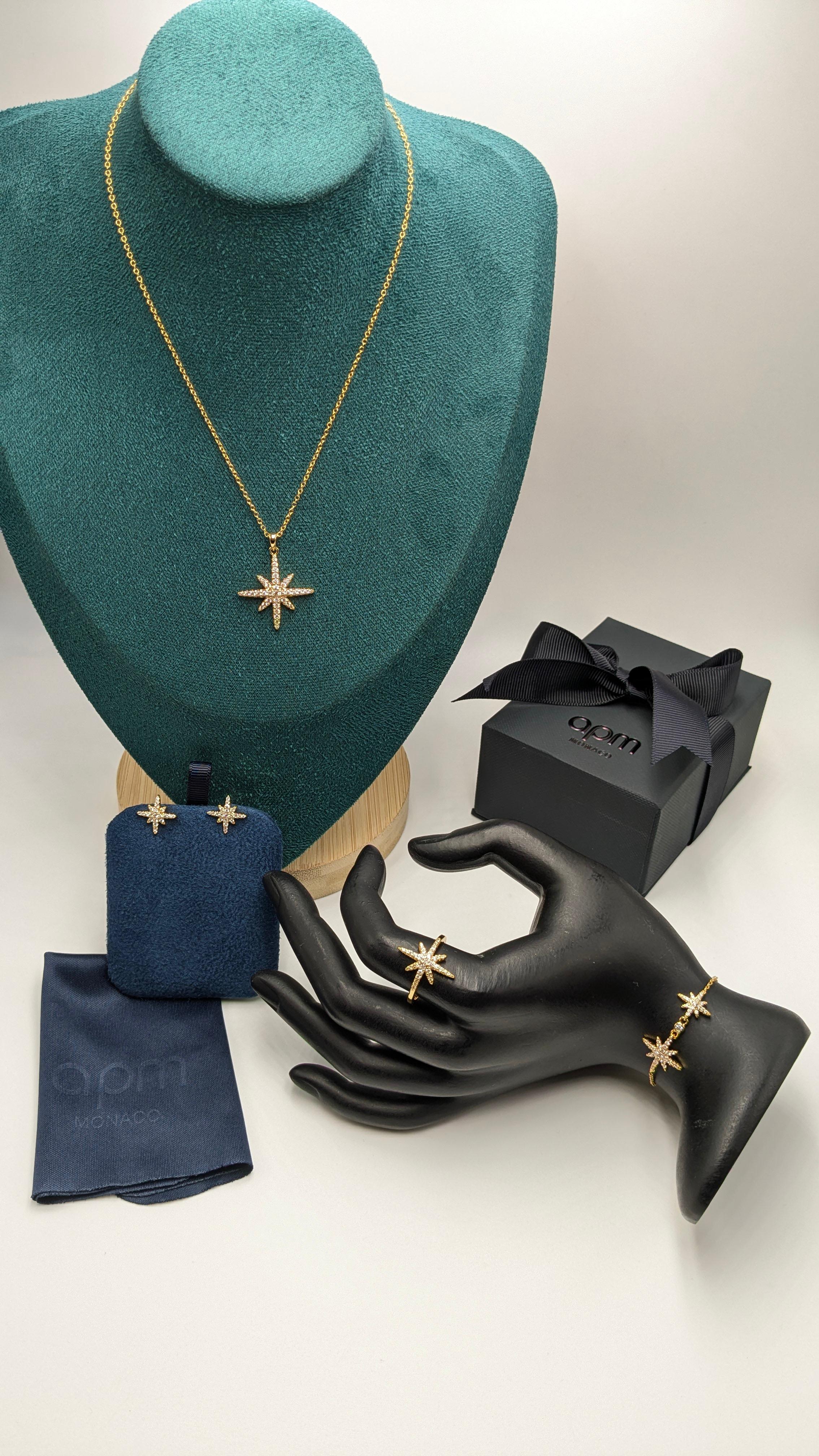 APM NECKLACE, EARRINGS, BRACELET & FINGER RING
